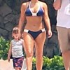 Kim Kardashian Enjoys Tropical Vacation, Engages in “Bikini Battle” with Sister Kourtney